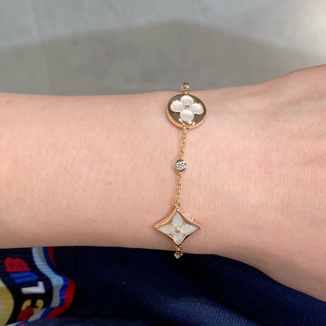 [Vera  Jewelry]STAR AND SUN 4 MOTIF WHITE MOP PINK GOLD BRACELET