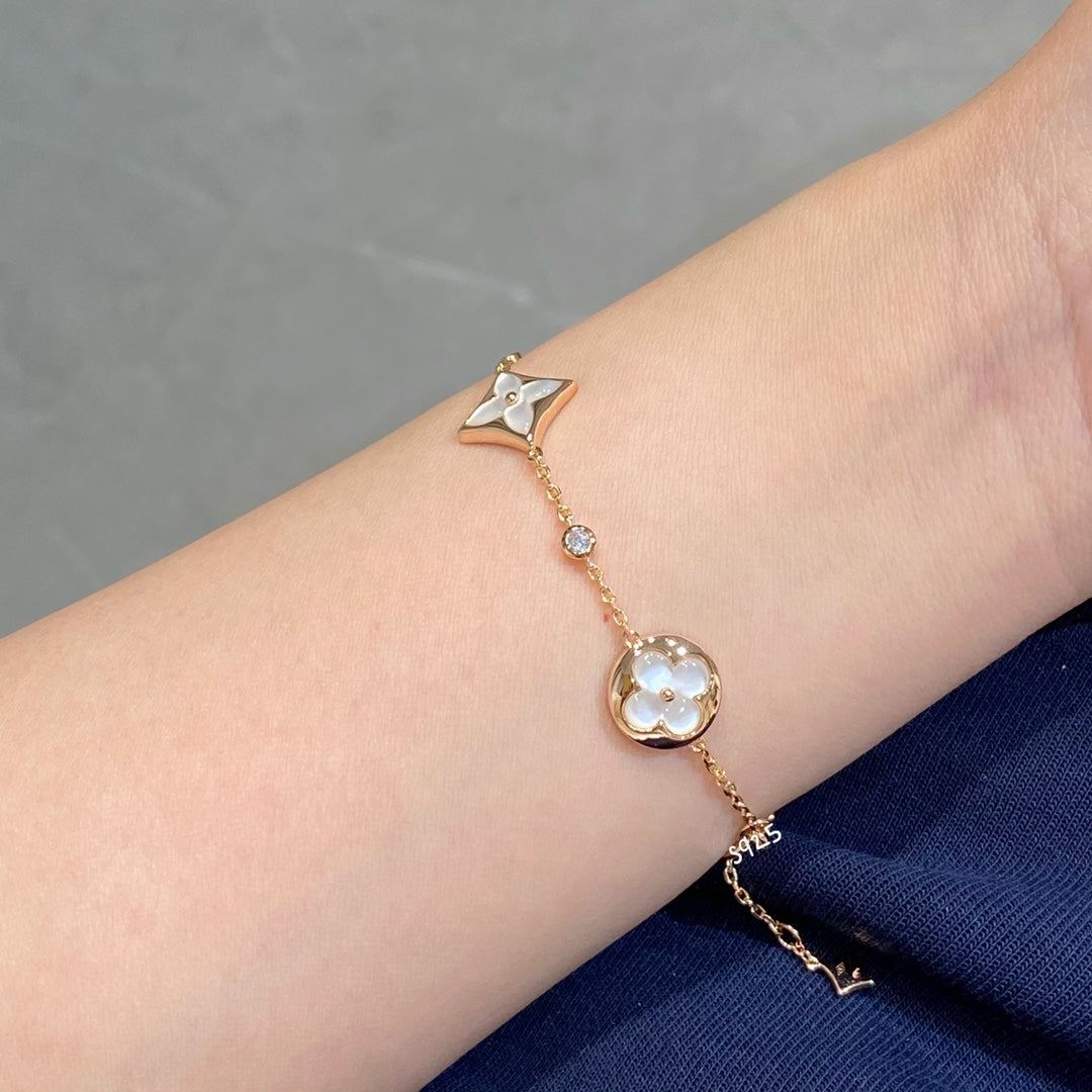 [Vera  Jewelry]STAR AND SUN 4 MOTIF WHITE MOP PINK GOLD BRACELET
